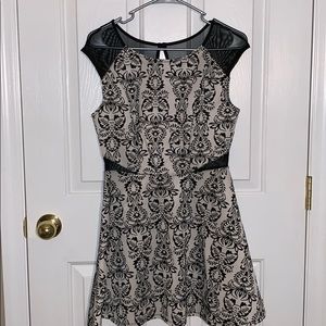 Black and white dress with mesh sleeves